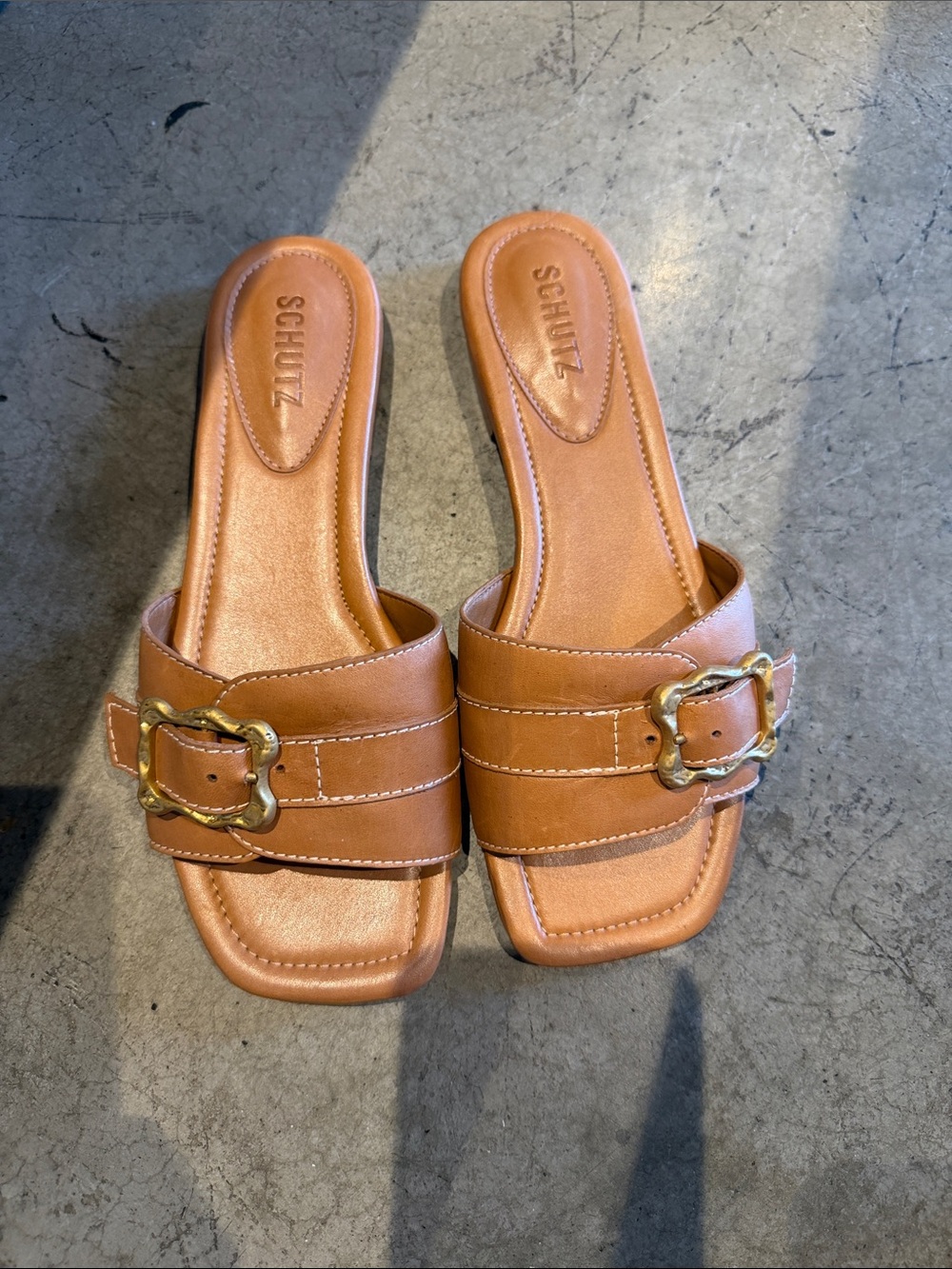 SCHUTZ Cognac Leather Slide Sandals with Gold Buckle